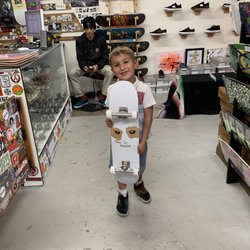 The House Of Vista - Grady with his The House board