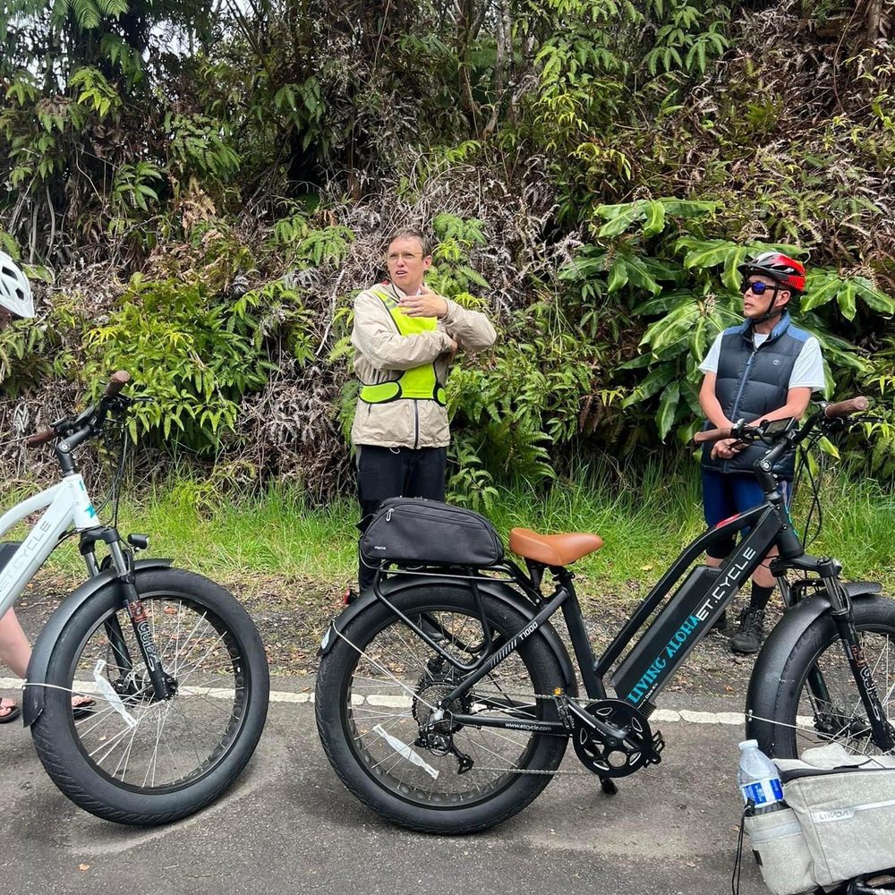 Volcano Ohana - Our Guide explaining bike details - Bike tours Near Me Volcano Ohana - Our Guide explaining bike details - Bike tours Near Me