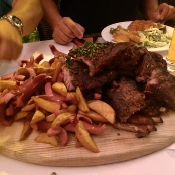 Schlosshotel Mondsee - Ribs, sausage, and potato platter - Hotels Near Me - Mondsee, 4