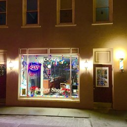 Exterior outside entrance of Vincenzo's Barbershop - Shop with Christmas lights - Monroe, New York Exterior outside entrance of Vincenzo's Barbershop - Shop with Christmas lights - Monroe, New York