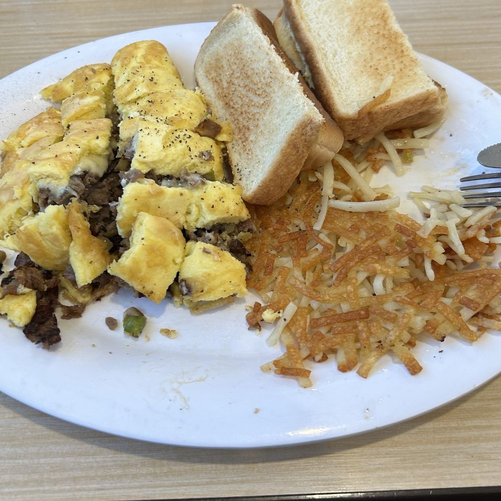 Huddle House - Philly Cheesesteak omelette with hash browns and toast. - American Near Me - Helen, Georgia