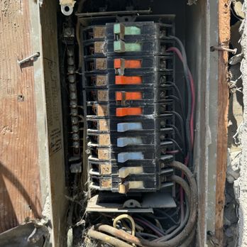 ElectraCore Construction - Internals of old electrical panel - Electricians Near Me