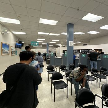 Satellite City Hall - People with appointments sit on chairs on the right. Express window stand on the left. - Departments of Motor Vehicles Near Me - Aiea, Hawaii Satellite City Hall - People with appointments sit on chairs on the right. Express window stand on the left. - Departments of Motor Vehicles Near Me - Aiea, Hawaii