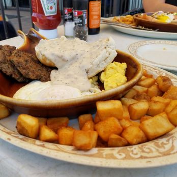 Another Broken Egg Cafe - Biscuits and gravy were fluffy, savory, and seasoned beautifully. - Breakfast & Brunch Near Me - Houston, Texas