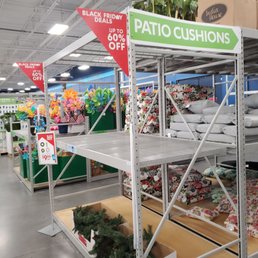 Section with a arrow pointing to patio cushions with a red sign that says Black Friday deals up to 60% off!