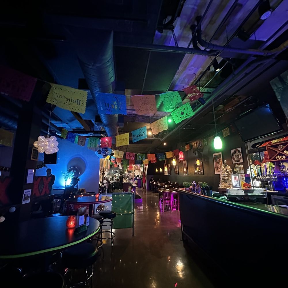 a dimly lit bar a dimly lit bar
