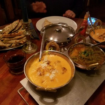 Balti House - Garlic and normal Naan bread, with butter chicken curry and sides - Indian Near Me - Amsterdam, New Hampshire