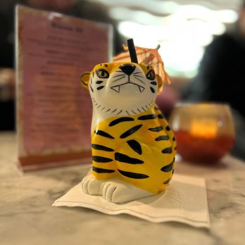 Cable55 - a cat figurine on a table - Cocktail Bars Near Me - San Francisco, California Cable55 - a cat figurine on a table - Cocktail Bars Near Me - San Francisco, California