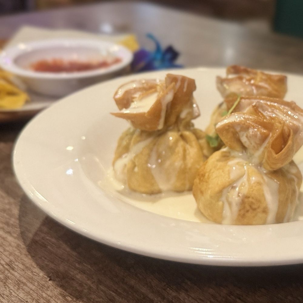 Jalisco Town Modern Mexican Grill - The mini moneybag chimichangas - Mexican Near Me - Gainesville, Florida Jalisco Town Modern Mexican Grill - The mini moneybag chimichangas - Mexican Near Me - Gainesville, Florida