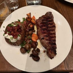 New York Striploin*with loaded backed potato