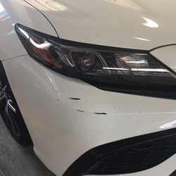 Budget Rent A Car - Usually scratches smaller than a quarter are accepted but not on this bad boy!