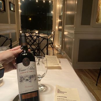 The Downtown Grocery - a bottle of wine on a table - New American Near Me - Ludlow, Vermont The Downtown Grocery - a bottle of wine on a table - New American Near Me - Ludlow, Vermont