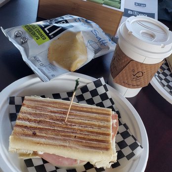 Boga Cafe & Bread - Cuban sandwich with chips and a cappuccino! So yummy! - Coffee & Tea Near Me - Kissimmee, Florida Boga Cafe & Bread - Cuban sandwich with chips and a cappuccino! So yummy! - Coffee & Tea Near Me - Kissimmee, Florida