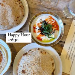 Pomp and Circumstance - Happy Hour. One pita, one dip, and one drink for $18