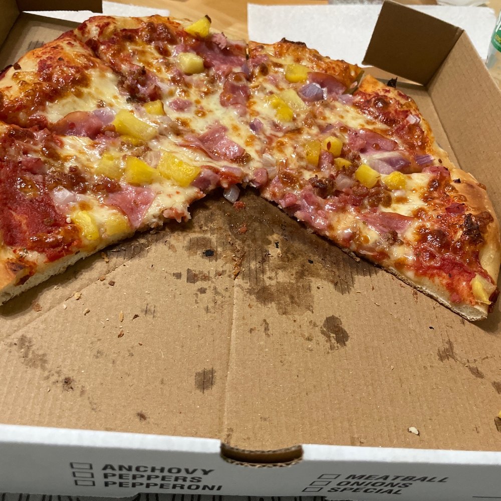 Cedar Key Pizza and Subs - a half eaten pizza - Pizza Near Me - Cedar Key, Florida Cedar Key Pizza and Subs - a half eaten pizza - Pizza Near Me - Cedar Key, Florida