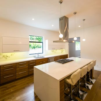 Treeium - Sunnyvale - a modern kitchen with a large island - General Contractors Near Me - Sunnyvale, California