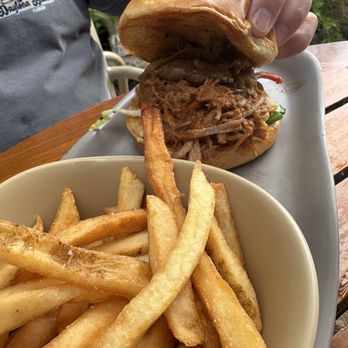 Hula Grill Kaanapali - Kailua pork sandwich with fries, well made, tasty. One of our favorite choices here. - New American Near Me - Lahaina, Hawaii Hula Grill Kaanapali - Kailua pork sandwich with fries, well made, tasty. One of our favorite choices here. - New American Near Me - Lahaina, Hawaii