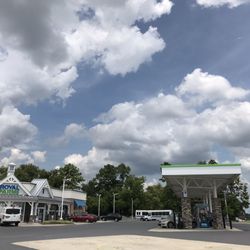 Royal Farms - Second line of gas pumps and storefront.
