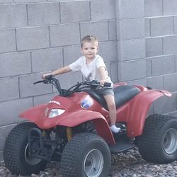 Motorcycle Accessory Shop - Grand son a few years ago