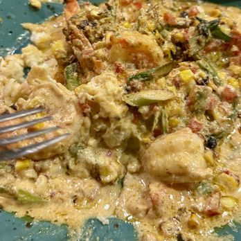 Busboys and Poets - Shrimp and grits (half way eaten) - Vegan Near Me - Washington, DC, District of Columbia