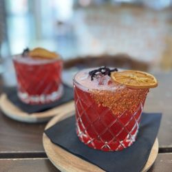 Oaxaca - Hibiscus Margarita: Sweet, tangy, smoky--mezcal magic in a glass.