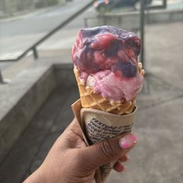 Standard scoop in a waffle cone Standard scoop in a waffle cone