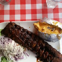 Tasty spare ribs with a baked potato and salad...Yummy