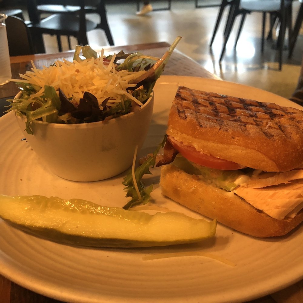 Pressed Cafe - Salmon BLT panini with side salad (only half of the panini shown here, you are served two halves). - Breakfast & Brunch Near Me - Chelmsford, Massachusetts Pressed Cafe - Salmon BLT panini with side salad (only half of the panini shown here, you are served two halves). - Breakfast & Brunch Near Me - Chelmsford, Massachusetts