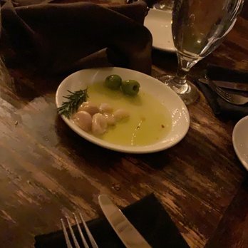 Tuscan Kitchen Salem - Olive Oil and Garlic with Complementary bread - Italian Near Me - Salem, New Hampshire Tuscan Kitchen Salem - Olive Oil and Garlic with Complementary bread - Italian Near Me - Salem, New Hampshire