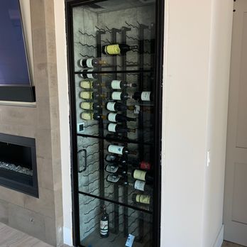 Coyote Glass, LLC - Wine enclosure 1/2 inch glass channel set pivot doors - Windows Installation Near Me - Phoenix, Arizona Coyote Glass, LLC - Wine enclosure 1/2 inch glass channel set pivot doors - Windows Installation Near Me - Phoenix, Arizona