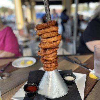 Ford's Garage - Giant Funnel Tower of Jumbo Piston Onion Rings - Burgers Near Me - Brandon, Florida Ford's Garage - Giant Funnel Tower of Jumbo Piston Onion Rings - Burgers Near Me - Brandon, Florida