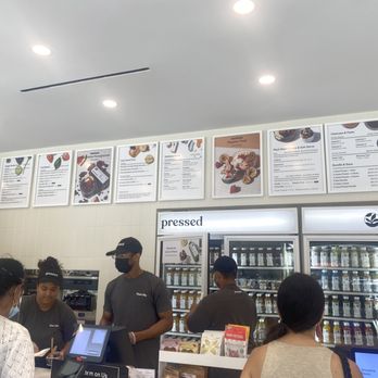 Pressed Juicery - customers at the counter - Juice Bars & Smoothies Near Me - New York, New York