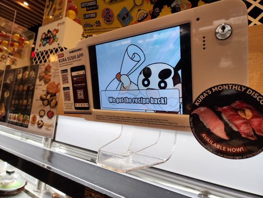 Kura Revolving Sushi Bar by null