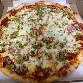 Heirloom Pizza - This pepperoni, sausage, green pepper and onions. The cheese on top holds all your goodies in. - Pizza Near Me - Plano, Texas