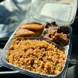 Ubuntu Cuisine - Joloff rice with goat and plantains