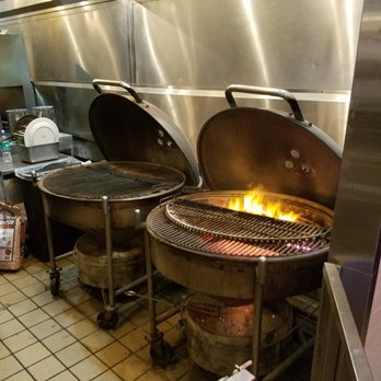 Weber Grill Restaurant - Watch them cook on the open large Weber grills - Barbeque Near Me - Lombard, Illinois Weber Grill Restaurant - Watch them cook on the open large Weber grills - Barbeque Near Me - Lombard, Illinois