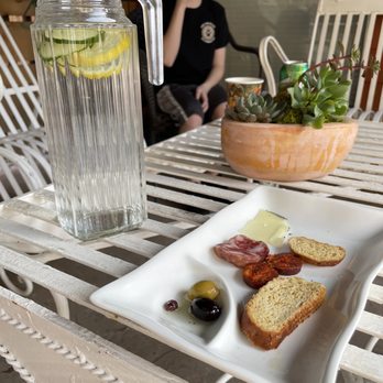 Bodega Del Sur Tasting Room - a plate of food and a pitcher of water - Wineries Near Me - Murphys, California