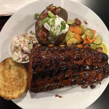 Cool Cat Cafe - Baby Back Ribs with loaded baked potato - Burgers Near Me - Kihei, Hawaii Cool Cat Cafe - Baby Back Ribs with loaded baked potato - Burgers Near Me - Kihei, Hawaii