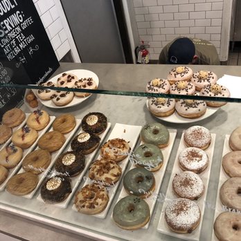 Hook And Press Donuts - 10 different flavors, I had the s'mores 4th from the left. - Donuts Near Me - Santa Barbara, California Hook And Press Donuts - 10 different flavors, I had the s'mores 4th from the left. - Donuts Near Me - Santa Barbara, California