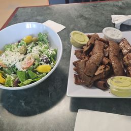 Beef kabob with a side of Gyro meat and a side salad! Beef kabob with a side of Gyro meat and a side salad!
