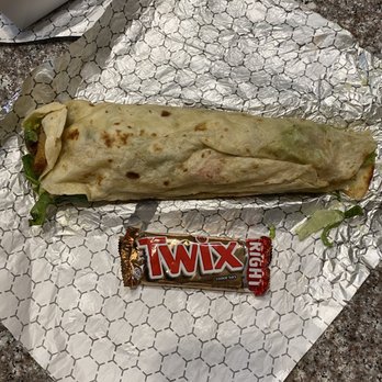 Saj - Gargantuan Chicken Shawarma Freshly Baked Wraps, Twix not included, used for scale - Mediterranean Near Me - New Orleans, Louisiana