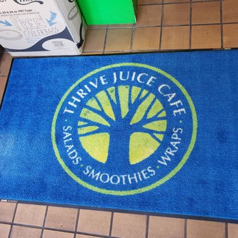 Thrive Gourmet - Mat as you enter the cafe. - Juice Bars & Smoothies Near Me - Arlington, Massachusetts