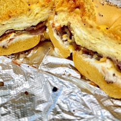 Lynbrook Deli & Catering - Bacon Egg and Cheese on an egg everything bagel salt pepper ketchup hot sauce and light cream cheese