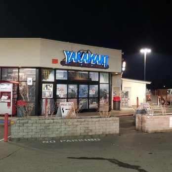 Yakamart  - he outside of a restaurant at night - Gas Stations Near Me - Toppenish, Washington