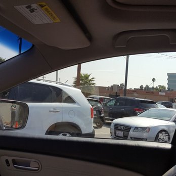 Chick-fil-A - Traffic of cars wrapped around into the street - Fast Food Near Me - Long Beach, California Chick-fil-A - Traffic of cars wrapped around into the street - Fast Food Near Me - Long Beach, California
