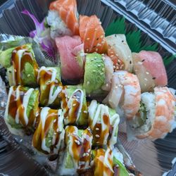 Yummy sushi - Shrimp tempura roll Rainbow roll Not pictured: salmon baked roll