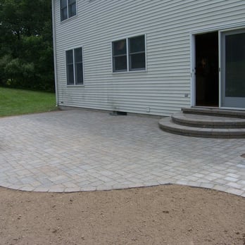 LLT Landscaping - a brick patio with steps - Tree Services Near Me