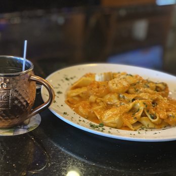 Acappella Italian Restaurant - a plate of pasta and a copper mug - Italian Near Me - Fallston, Maryland Acappella Italian Restaurant - a plate of pasta and a copper mug - Italian Near Me - Fallston, Maryland
