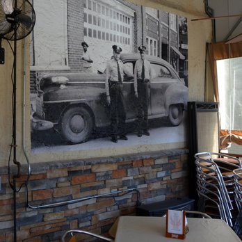 Old Stone Steakhouse - Photo of the Belmont Police Dept painted onto the wall on the patio - Steakhouses Near Me - Belmont, North Carolina Old Stone Steakhouse - Photo of the Belmont Police Dept painted onto the wall on the patio - Steakhouses Near Me - Belmont, North Carolina