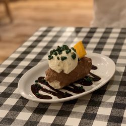 The Cowgirl BBQ - Dessert. Ice cream disguised as a baked potato! The "cheese" was delicious.